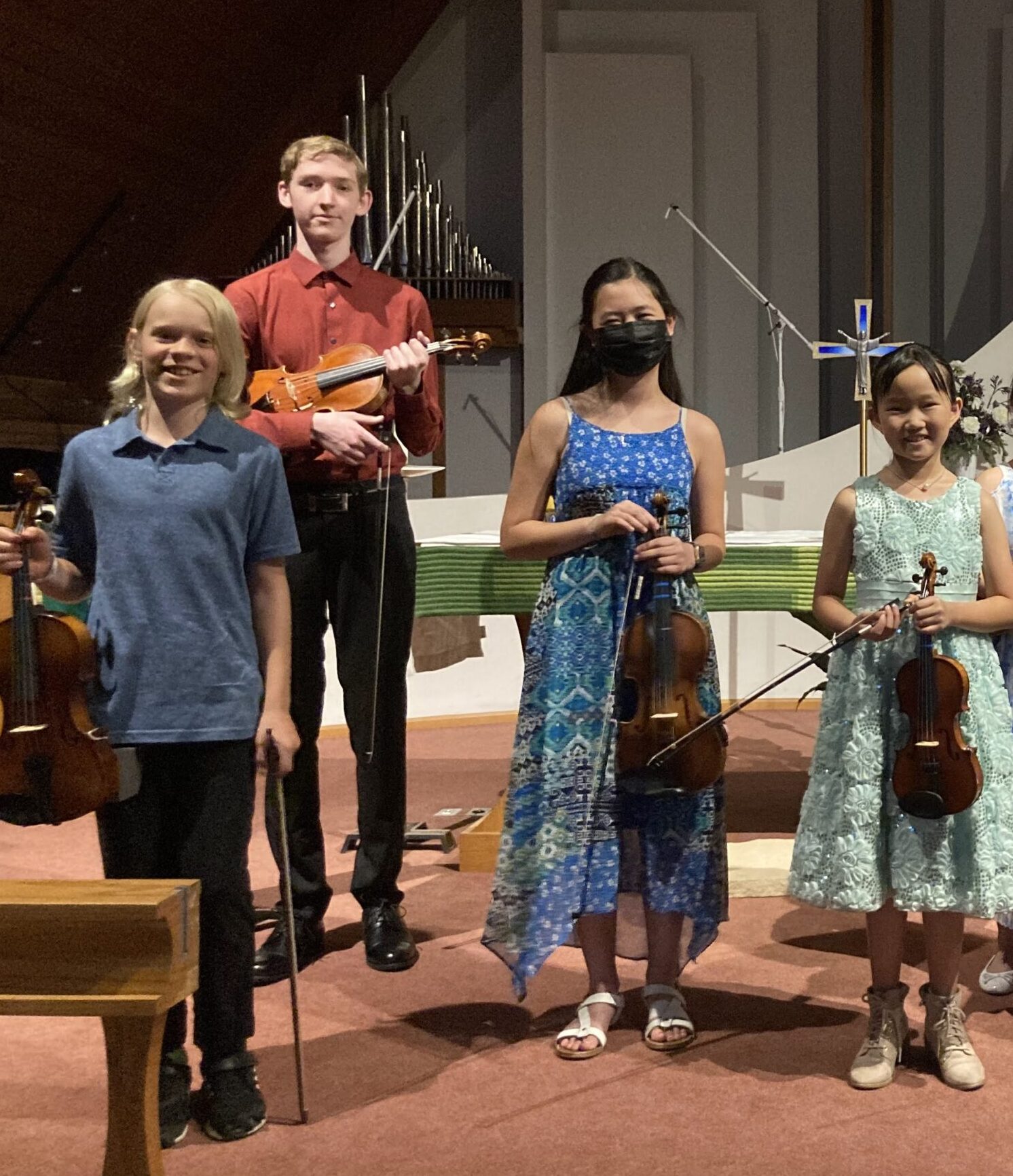 Students playing violins